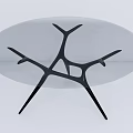 Modern Oval Coffee Table With Glass Top And Branch Like Black Copper Metal Base