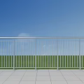 Outdoor Silver Metal Railing with Blue Sky Green Grass and Tile Floor