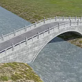 Scenic Traditional Stone Arch Bridge Spanning River With Stone Railings And Green Grassland