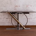 Modern Console Table With Circular Metal Frame And Smooth Top Against Textured Brick Wall