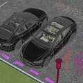Two Black Tesla Sedans Parked in Parking Lot with Two People Walking Nearby
