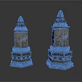 Two Ancient Stone Sculptures With Intricate Tower Shaped Design And Detailed Patterns