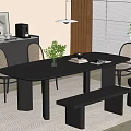 Modern Black Dining Table Set With Wicker Back Chairs Bench And Potted Plant