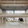 Modern Lobby Front Desk Reception With Large Windows Natural Light And Green Plants