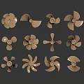 Multiple Brass Propellers With Different Blade Designs Arranged On Dark Surface