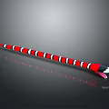 Red Black White Striped Snake With Tongue Sticking Out On Shiny Gray Surface