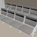 Multiple Rows of Gray Public Chairs with Metal Frames in Indoor Waiting Area
