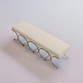 Stylish White Cushioned Bench With Golden Curved Metal Frame and Minimalist Design