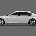 White Modern Sedan With Sleek Body Design And Silver Alloy Wheels