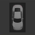 Silver Sleek Sports Car With Shiny Exterior And Modern Alloy Wheels