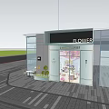 Elegant L'amie Florist Storefront Design With Glass Windows Flower Displays And Green Plants