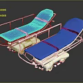 Two Blue Wheeled Nursing Beds With Metal Frame And Black Straps For Home Care
