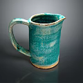 Handcrafted Turquoise Ceramic Cup With Textured Surface And Unique Design On Dark Background