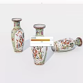 Three Traditional Ceramic Vases with Colorful Hand-Painted Patterns and Intricate Designs