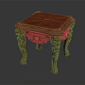 Traditional Red Wooden Table With Intricate Carvings On Legs And Frame