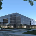 Modern Glass Curtain Wall Office Building With Landscaped Courtyard And Artistic Sculptures
