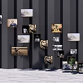 Wall Art With Framed Pictures Dark Striped Backdrop Wooden Floor Small Green Plant And Shelf