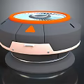 Modern Circular Device With Gray Body Orange Rim White Dial And Pointer