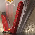 Red V Shaped Sculpture With Stars And Flames Against Stone Relief Wall