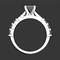 Elegant Platinum Diamond Ring With Central Stone And Side Accent Diamonds