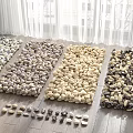 Piles of Various Colored Stones Arranged On Wooden Floor With Slippers