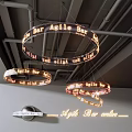 Ring Shaped Chandeliers with Illuminated Agile Bar Text in Bar Style Gray Ceiling and Pipes