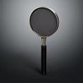 Vintage Magnifying Glass With Metal Frame And Black Handle On Dark Background