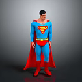 Male Superhero in Blue Costume with Red S Symbol Red Cape and Boots Standing on Gray Background