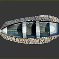 Green and White Cape Bay Model Boat Placed on Rock Base
