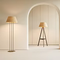 Modern Floor Lamps With Beige Fabric Shades And Metal Tripod Bases In Minimalist Interior