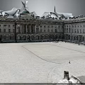 Classical Building Courtyard With Snow Covered Ground Green Dome Arched Windows Columns And Surrounding Railings