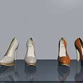 Stylish White And Orange High Heels Displayed On Gray Surface With Reflections