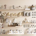 Elegant Jewelry Collection Display on Shelves with Mannequins Necklaces Earrings and Rings