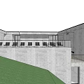 Modern Concrete Building Exterior With Large Windows Balconies And Green Lawn