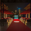Check in Photo Spot With Red Carpet Red Umbrellas And City Skyline At Night