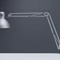 Modern Silver Desk Lamp With Adjustable Long Arm Round Lampshade And Stable Base