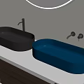 Modern Bathroom With Black And Blue Oval Shaped Washbasins On White Countertop