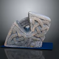 Wood Stone Sculpture Featuring Intricate Knotwork Design On Blue Base With Texture