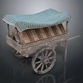 Vintage Wooden Hand Cart With Striped Canopy And Rustic Wooden Wheels