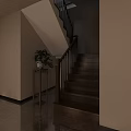 Wooden Staircase With Metal Handrail Green Plant On Small Table Light Walls And Marble Floor