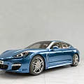 Blue Porsche Panamera Luxury Sedan With Streamlined Design In Indoor