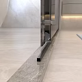 Modern Textured Stainless Steel Door Handle Mounted On Glass Door With Marble Wall Interior