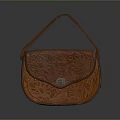 Brown Leather Handbag With Carved Floral Patterns And Metal Clasp