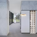 Modern Public Restroom Interior Design With Gray Tiled Walls Sinks Mirrors Stalls And Small Plant