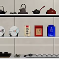 Elegant Tea Set with Teapots and Tea Canisters on Display Shelf in Minimalist Style