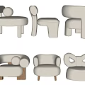 Modern Upholstered Single Seater Sofa Designs With Curved Shapes Bow Detail And Wooden Legs