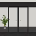 Modern Glass Sliding Door With Black Frame And Green Plant In White Pot