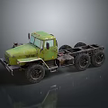 Vintage Green Heavy Duty Truck With Exposed Chassis And Multiple Wheels