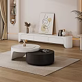 Modern Black And White Round Nested Coffee Table On Beige Rug With TV Stand Decor