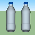 Clear and Refreshing Bottled Water in Two Transparent Plastic Bottles with Blue Caps